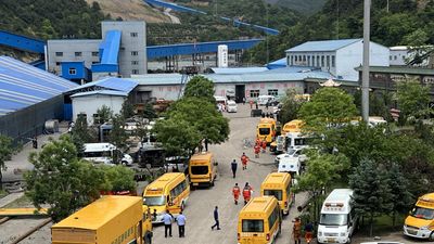 China lowers coal mine explosion death toll to 82