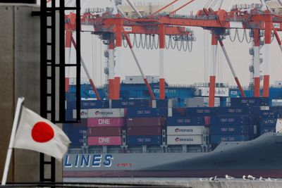 Japan trade minister holds brief talks with Chinese counterpart amid diplomatic row