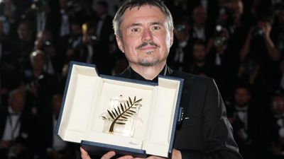 Romanian director wins Palme d'Or at emotional Cannes ceremony