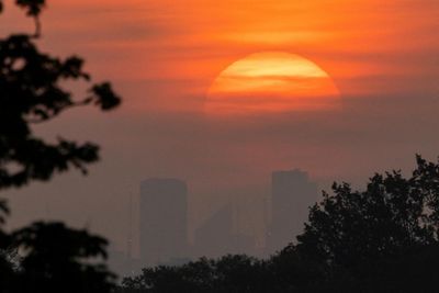 UK records heatwave as parts of England hit record highs for May