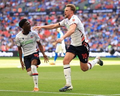 Bolton promoted to Championship after Dalby’s overhead kick floors Stockport