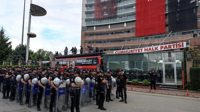 Turkey riot police use tear gas to drive ousted opposition leader from party HQ