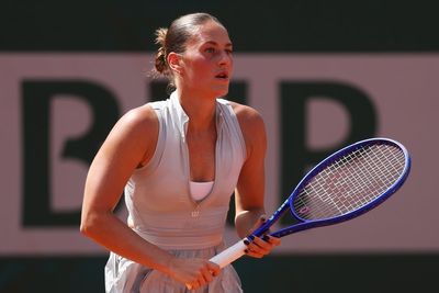 Ukrainian Marta Kostyuk battles through missile strike grief to win French Open match