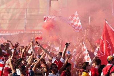 In pictures: Arsenal fans celebrate Premier League title as thousands flock to Emirates Stadium