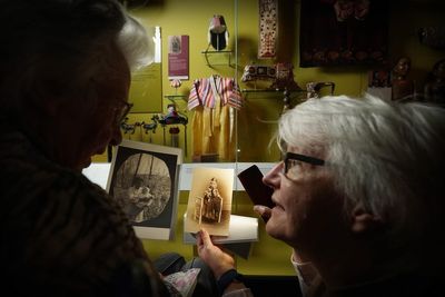 Care home resident reunited with traditional garment from 100 years ago