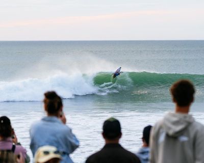 World Surf League event in NZ put on hold after Australian photographer bitten by ‘shark or a sea lion’