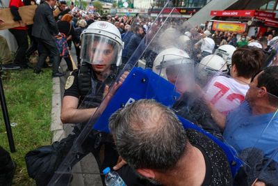 Turkish police storm opposition party headquarters as leadership dispute turns violent