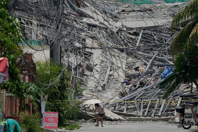 Photos show the aftermath of a building collapse in the Philippines