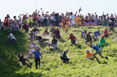 German YouTuber pips local man to win Gloucestershire cheese-rolling contest