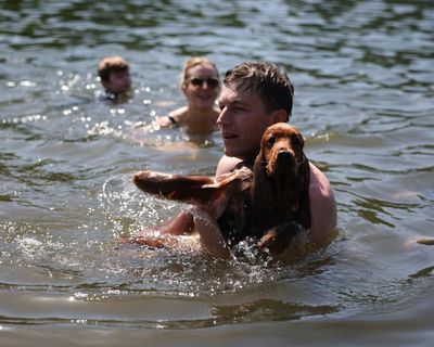 UK records its hottest ever day in May as temperature hits 34.8C