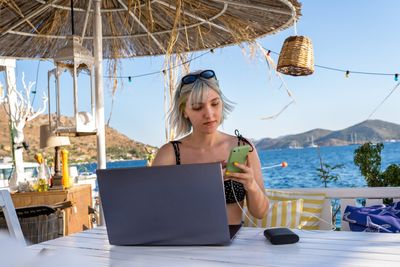 Forget quiet quitting—instead, millennials are taking ‘quiet vacations’ and checking out of work (and the country) on company dime