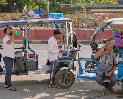 ‘My head spins with the heat’: India’s gig workers battle exhaustion amid soaring temperatures