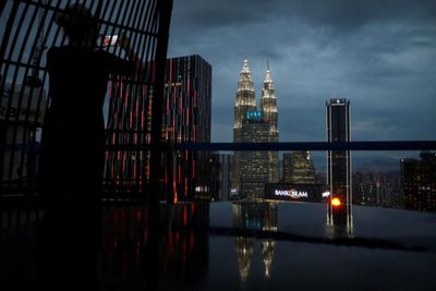 Malaysian police arrest 51 men, seize drugs in raids linked to 'gay party'