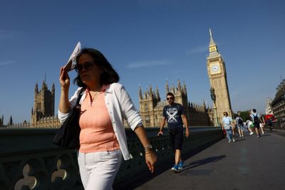 London swelters through 'tropical night' – as more temperature records could be broken today