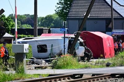 Four killed as train hits school bus on level crossing in Belgium