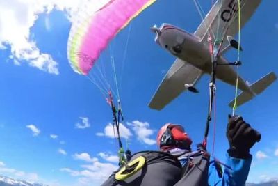 Paraglider narrowly escapes death after mid-air collision with plane over Austrian Alps