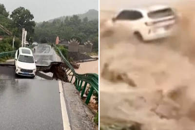 Moment car is dragged into raging flood waters as bridge collapses in China