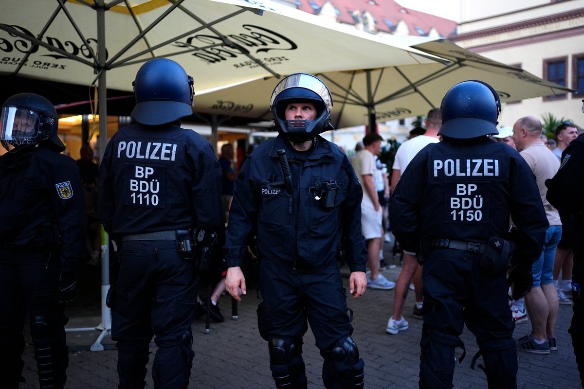 Violence erupts as police intervene in clash before…