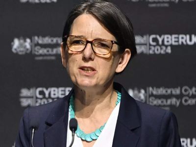 UK spy chief warns Russia cyber threats could overwhelm Britain and allies