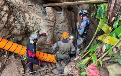 5 of 7 people trapped in Laos cave found alive