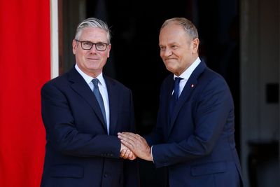 Starmer hails ‘generational uplift’ as he signs defence pact with Poland’s Tusk