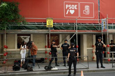 Spanish police search ruling Socialist party headquarters as problems deepen for Pedro Sanchez
