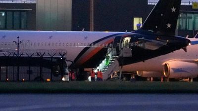 Manchester Airport partially closed by police after man spotted on upper floor fencing