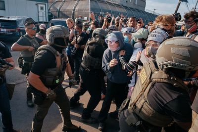 Photos show protestors and ICE agents clashing outside a New Jersey detention center