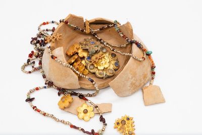 Clay pot buried by Mecca pilgrim found to contain gold, silver and gem-encrusted jewellery