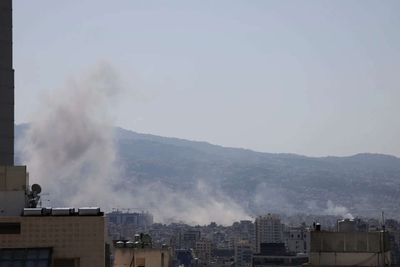 Israel strikes Beirut's southern suburbs after Hezbollah attacks