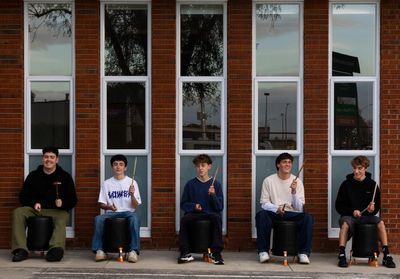One bucket, two sticks and a million followers: how five NZ teens hit drumming fame