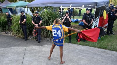 Tensions flare, protesters evicted from 2032 Games site
