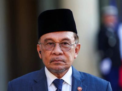 Malaysia PM Anwar under pressure amid growing defections from his party