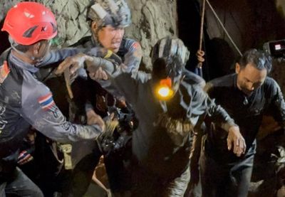 Rescuers free one of seven trapped in Laos cave