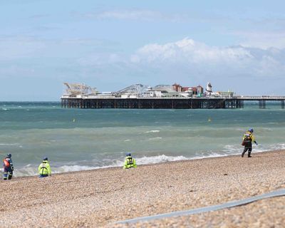 Cause of deaths of three sisters found in sea at Brighton still unclear, inquest hears