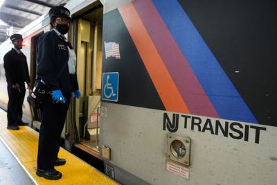 Rail car fire near New York's Penn Station injures 5, snarls morning commute, train service delayed