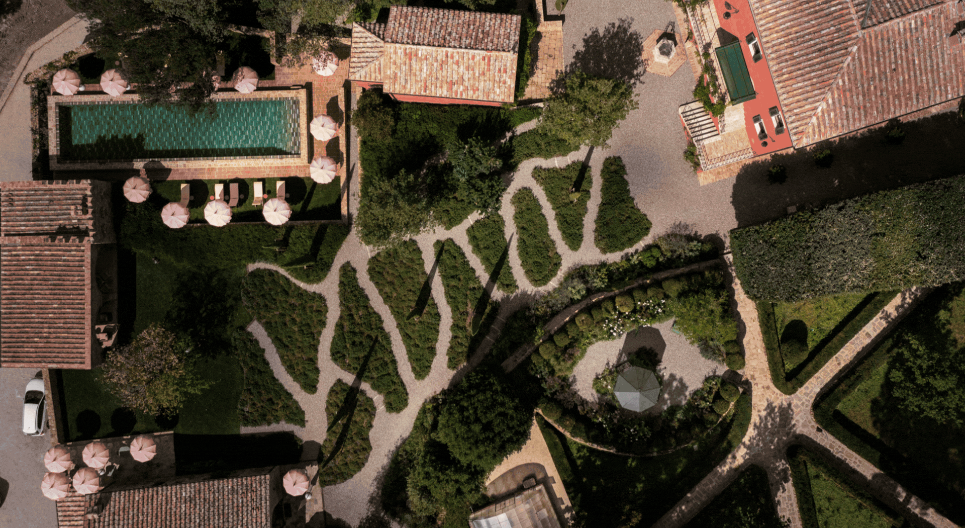 These 7 Hotels' Breathtaking Gardens Will Keep You Cool Amid Sweltering Temperatures — And Set the Mood for Just-as-Dazzling Interiors
