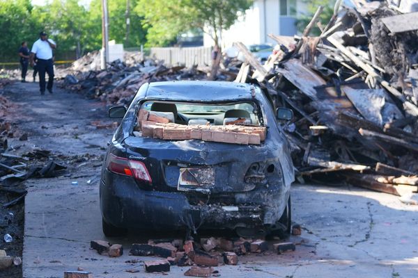 Crews scour the site of a deadly Dallas apartment blast and fire searching for more possible victims