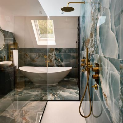 Clever design tricks transformed this tricky, awkward space into a stylish and modern ensuite bathroom