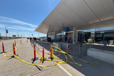 Car crashes into a passenger terminal at Detroit Metropolitan Airport, driver arrested