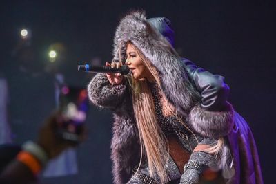 Lil’ Kim review – formidable rap legend delivers mostly vibes, but the crowd is here for it