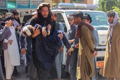 At least 22 refugees returning from Pakistan killed after truck overturns in eastern Afghanistan