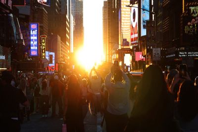 ‘Manhattanhenge’ causes Times Square to grind to a halt as crowd capture biannual event