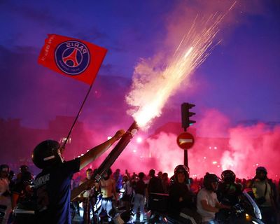French police arrest 780 after violent clashes as PSG fans celebrate Champions League win