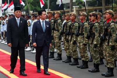 Japan refutes 'new militarism', accuses China of rapidly arming