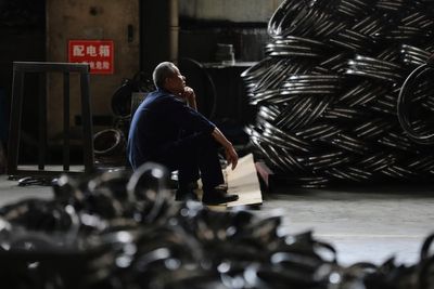 China’s factory activity slows in May, raising questions over its economy