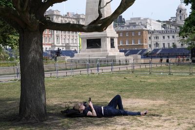 UK’s record-breaking heatwave to end with torrential rain forecast