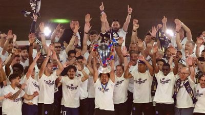 Huge crowds greet PSG players as they parade Champions League trophy in Paris