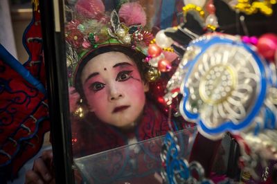 Chris Yan's photo series about a Chinese New Year festival is a masterclass in using color and framing to evoke meaning