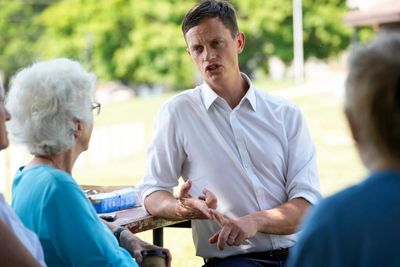 ‘Our democracy is run by two private clubs’: can a pro-hunting Democrat lead a blue wave in Iowa?